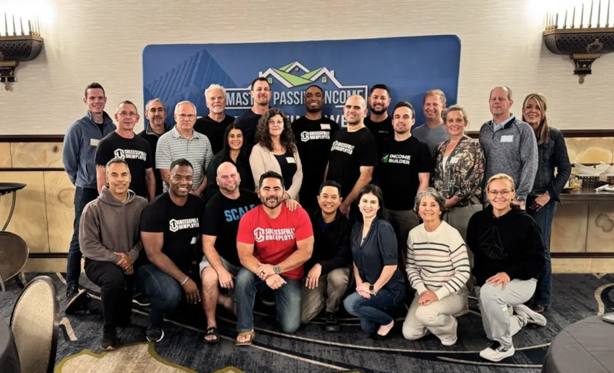 Dustin Heiner with the Master Passive Income mastermind group in Denver